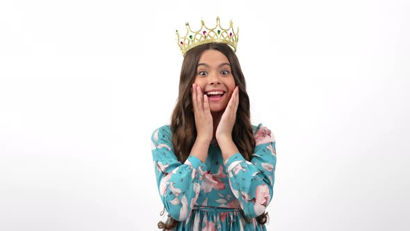 Happy Egocentric Child in Queen Crown Pointing Thumb Up on Herself Egoistic alt