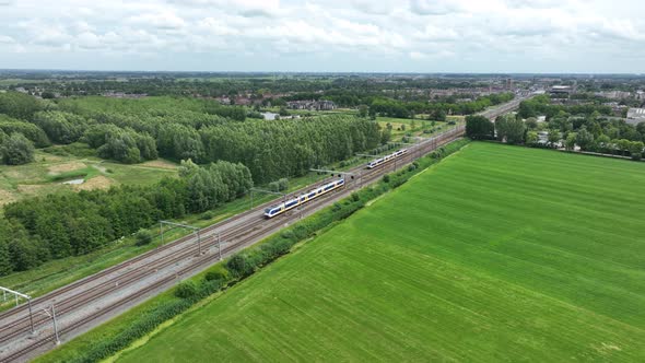 Dutch Moving Commercial Train in Nature Forrest Landscape alt