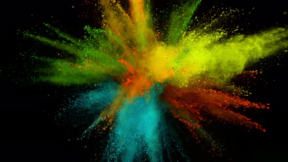 Super Slowmotion Shot of Color Powder Explosion Isolated on Black Background alt