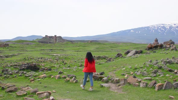 Female Toursit Walk Aorund Ani Ruins alt