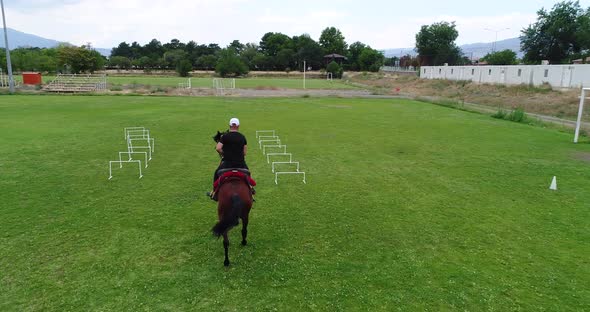 Man Riding a Horse