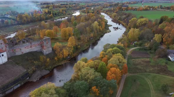 Bauska Medieval Castle Ruins Complex and Park From Above Aerial Shot 4K Video alt