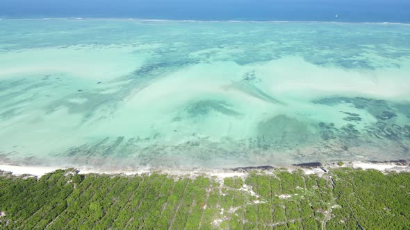 Zanzibar Tanzania  Aerial View of the Ocean Near the Shore of the Island Slow Motion alt