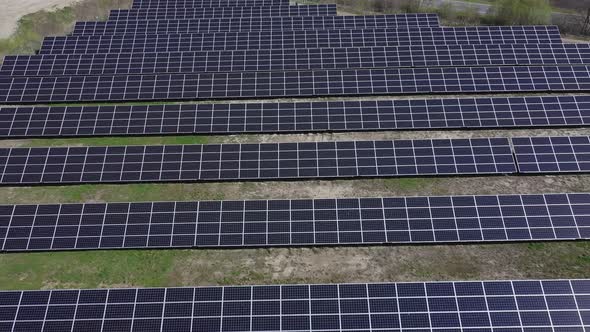 Solar panel produces green, environmentaly friendly energy. Aerial view from drone alt