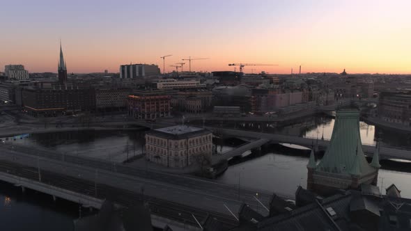 Drone Shot Flying Over Buildings Roof in Stockholm