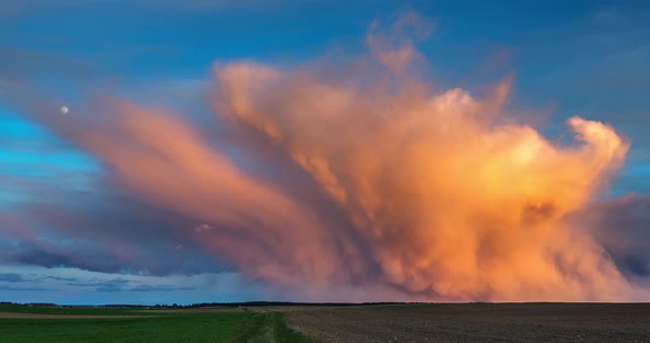 Mammatus Clouds at Sunset Timelapse with Moon