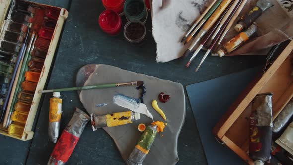 Top Down of Painting Tools and Supplies on Table alt