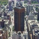 Top view of an urban area of Manhattan on a sunny day with traffic in the streets, static shot. - VideoHive Item for Sale