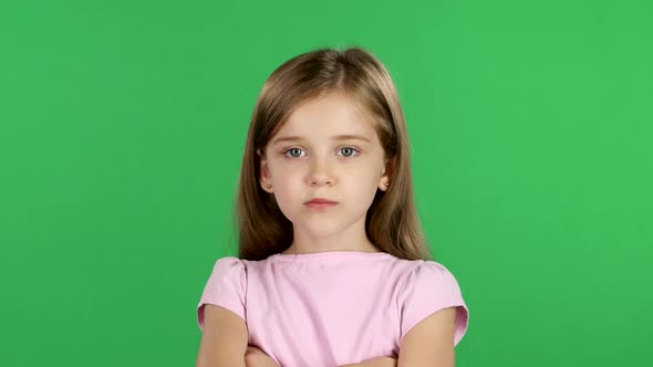 Child Sighs Heavily, She Is Tired. Green Screen alt