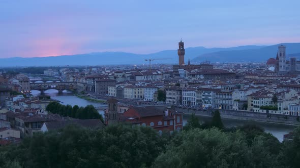 Beautiful pink sky over Florence city in Italy - sunset time lapse shot alt