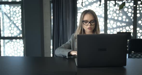 Businesslady Working on Laptop