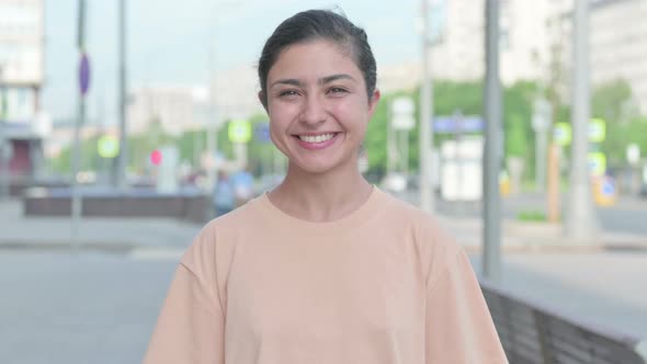 Portrait of Indian Woman Shaking Head As Yes Sign Approval alt
