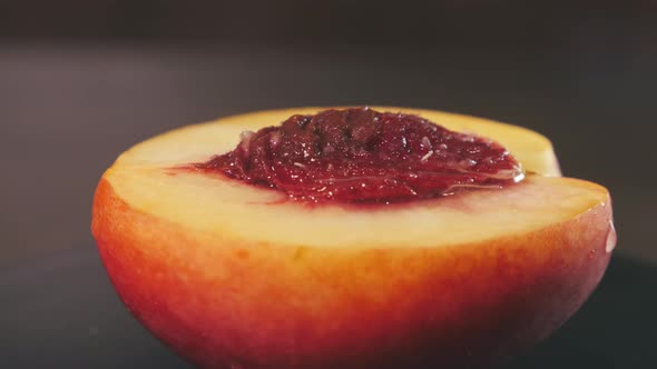 Nectarine with Bone in a Cut Closeup Rotates alt