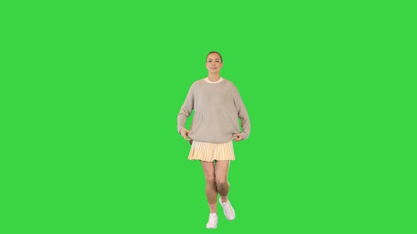 Happy Healthy Sporty Girl Running on a Green Screen Chroma Key alt