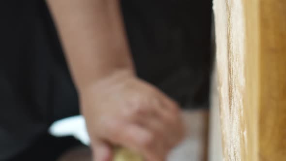 Vertical Shot Close Up Female Pastry Cook Raw Dough with Rolling Pin for Home Baked Bread