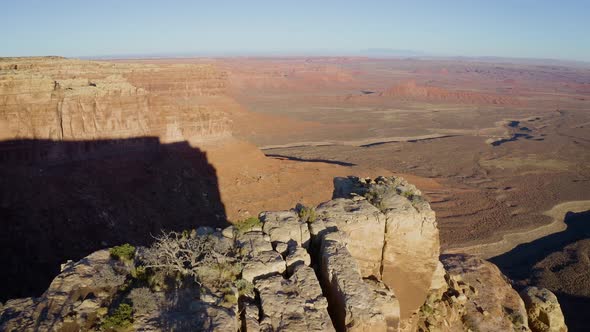Aerial shot of the cliffs along the edge of Cedar Mesa in Southern Utah alt