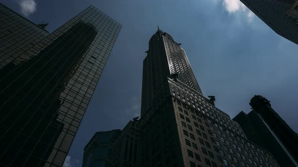 Chrysler Building viewed from low angle with clouds