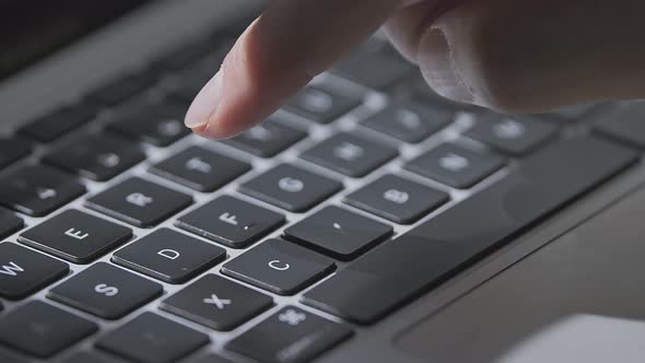 Close Up of a Young Man Hand Busy Typing