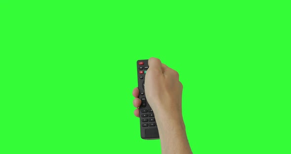 Isolated Male hand with TV remote pressing button turn on or off TV. Green screen. Pack of Gestures. alt