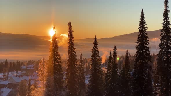 A Fabulous View of the Winter Dawn in the Mountains the Rays of the Sun Beautifully Shimmer in the alt