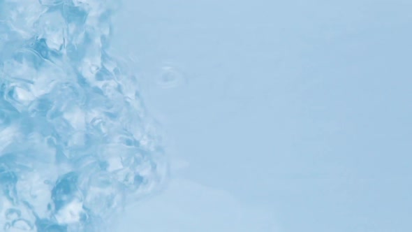 Close Up View on Water Texture with Water Drops on the Water Overlay Effect for Video Mockup