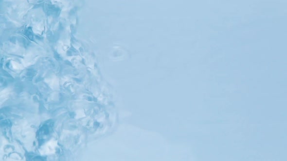 Close Up View on Water Texture with Water Drops on the Water Overlay Effect for Video Mockup alt