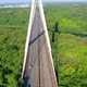 Aerial tilt-up descending over Mauricio Baez bridge in Dominican Republic