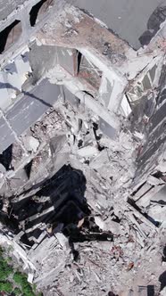 Vertical Video of a Destroyed Residential Building in Ukraine During the War alt