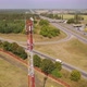 Cell Site of Telephone Tower with 5G Transceiver By Highway Intersection - VideoHive Item for Sale