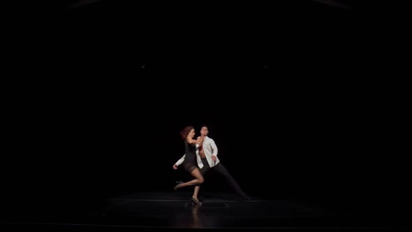 Ballroom Dancers Couple on Dark Stagedance Performance Part