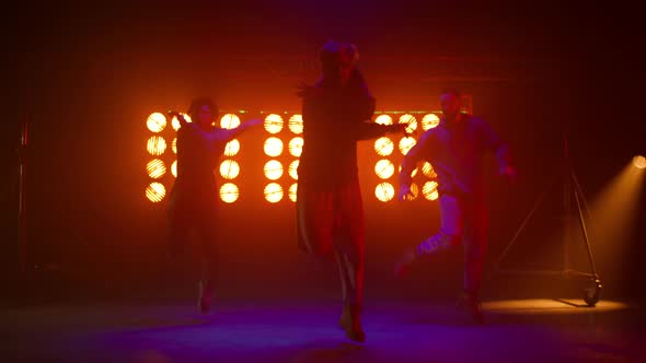 Hiphop Performers Moving Rhythmical on Night Club alt