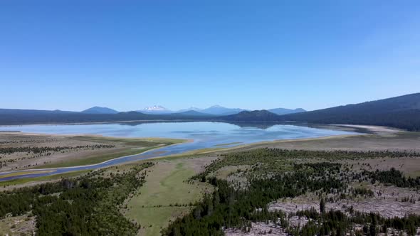 Drone footage of lake with mountains 4k