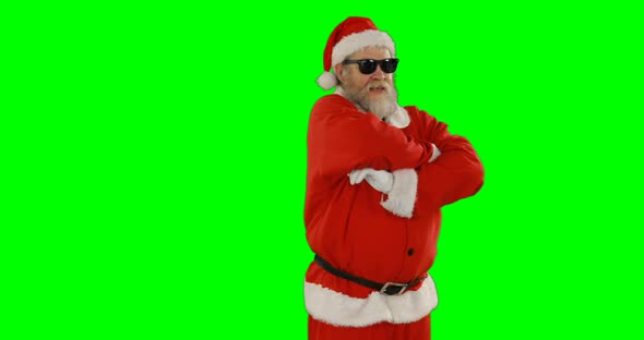 Santa claus posing with sunglasses alt