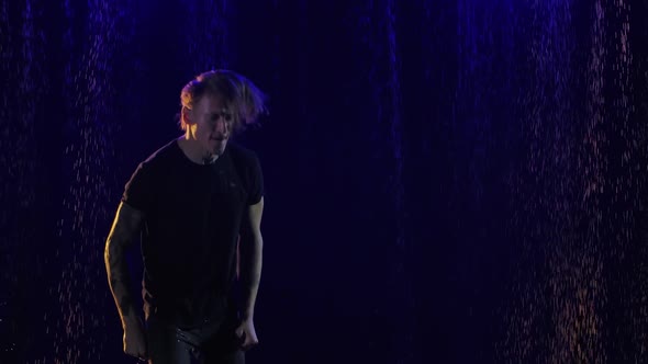 Long Haired Rock Musician Emotionally Sings Gestures and Moves Expressively to the Beat of the Music alt