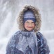 Portrait of a Beautiful Blonde Little Boy in the Winter Forest with Falling Snow - Slow Motion Video - VideoHive Item for Sale