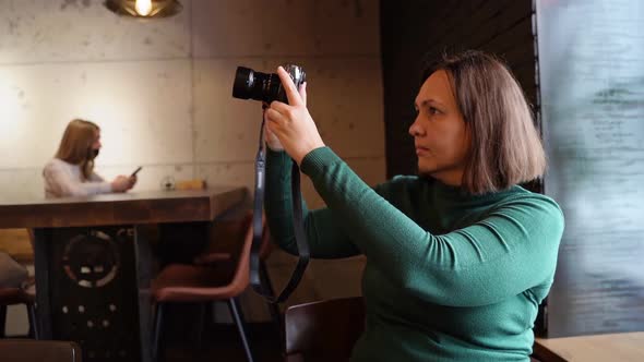 Woman Shoot Video on Photocamera