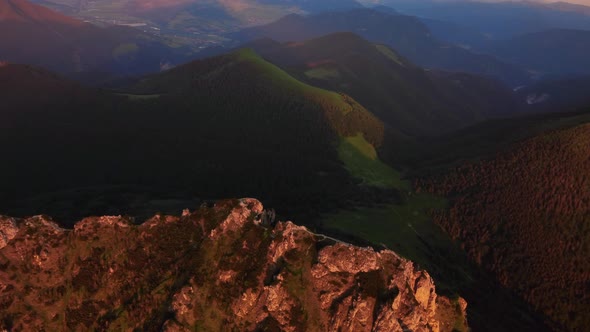 Aerial Video in the Golden Hour on Top of the Mountain at Sunset