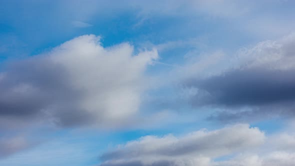 Mixed Clouds Flying on Blue Sky at Autumn Day Light  Telephoto Time Lapse