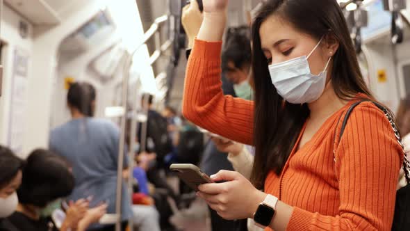 Young asian woman cover mouth , wear medical face mask to protect viruses alt
