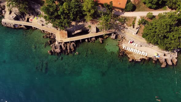 View of the beach and blue sea coast of Lovran, Croatia, August 2019 alt