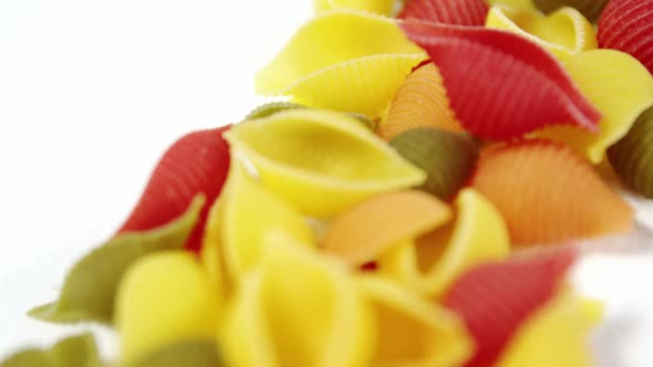 Colorful pasta on white background alt
