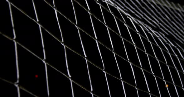 Soccer ball in goal post against goalkeeper 4k alt