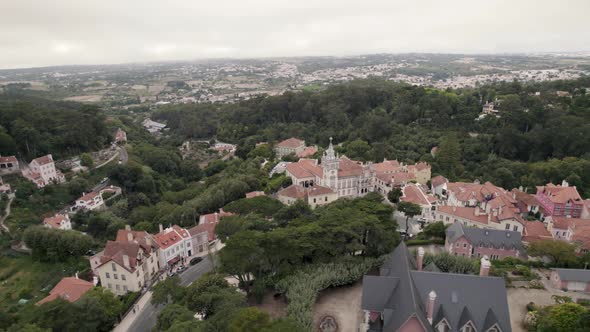Extravagant Sintra Town Hall building against Natural Park , Portugal. Orbiting shot alt