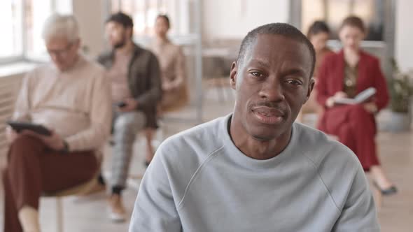 Portrait of Young African Businessman alt