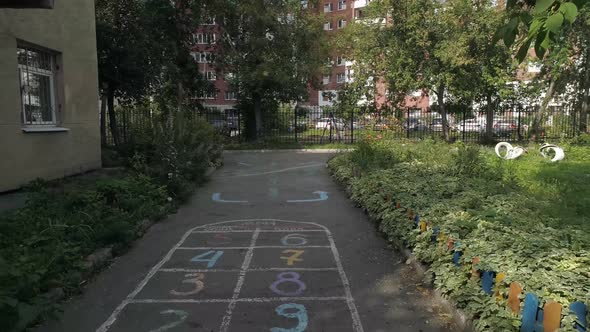 Drone view of children's drawings on the asphalt 22 alt