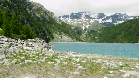 Mountain Landscape with Clouds and Lake at Alpe Devero in Devero Valley Piemonte Italy alt