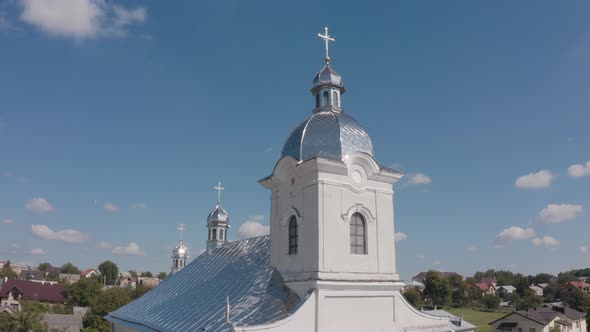 Dome of Church. Aerial View. Traditional Old Church in Ukraine Small Village. Blue Sky Background alt