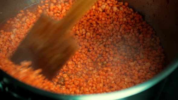 Chef Cooking And Stirring Red Tomato Vegetables Soup With Spices.Homemade Turkish Recipe Food In Pot alt
