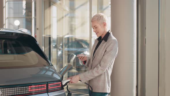 Concept of Buying Electric Eco Vehicle Charging alt