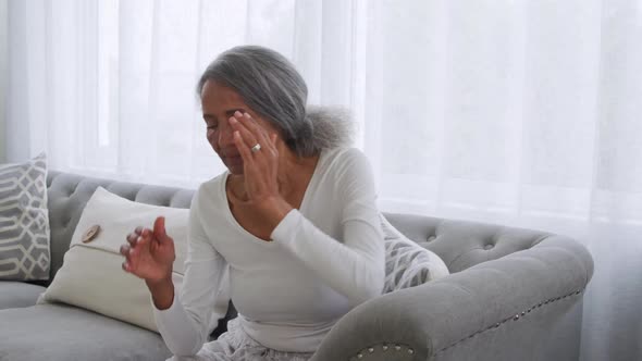 Mature woman at home alt